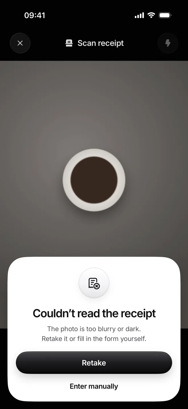 Couldn’t read the receipt over a photo of a coffee cup, with Retake and Enter manually