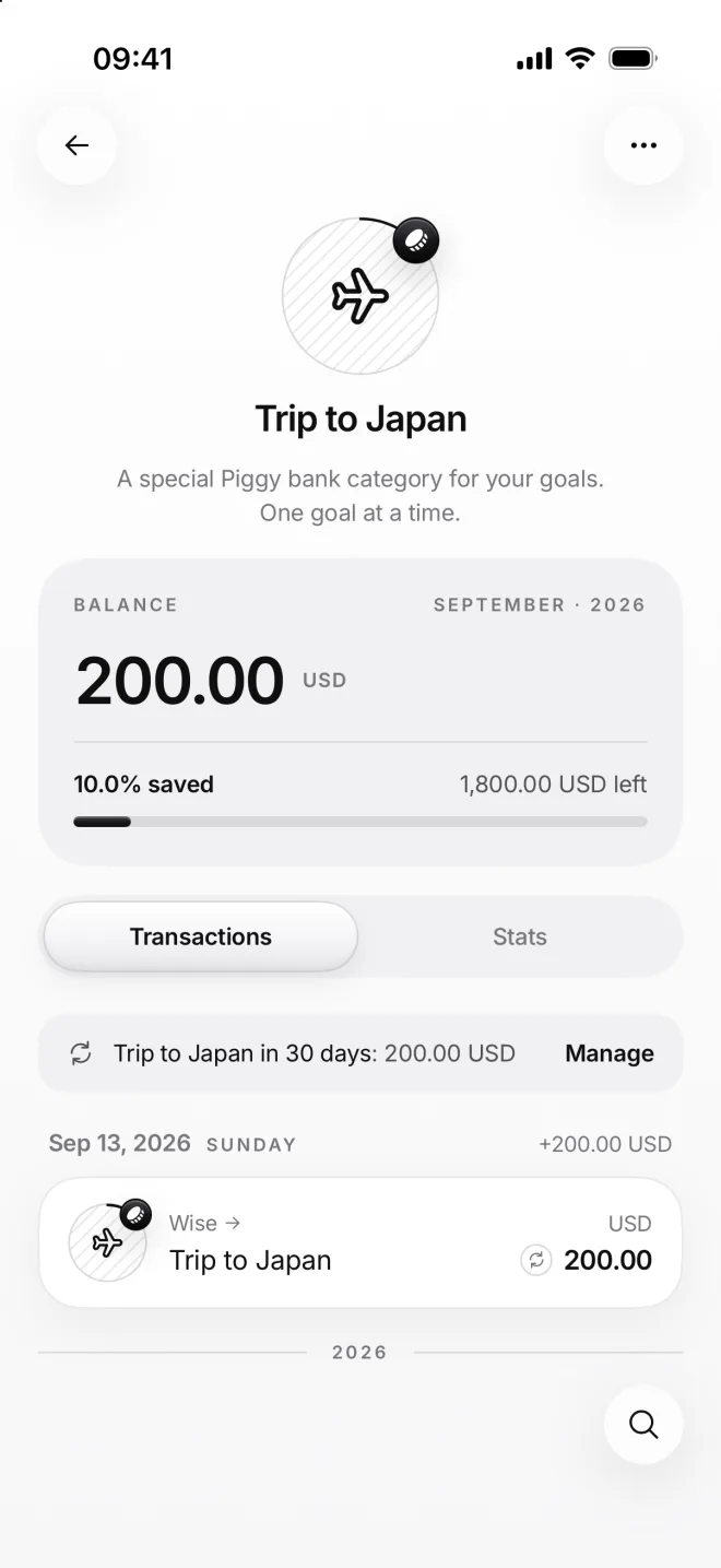The Trip to Japan page: 200.00 dollars, 10.0% saved, 1,800.00 USD left, the next transfer in 30 days